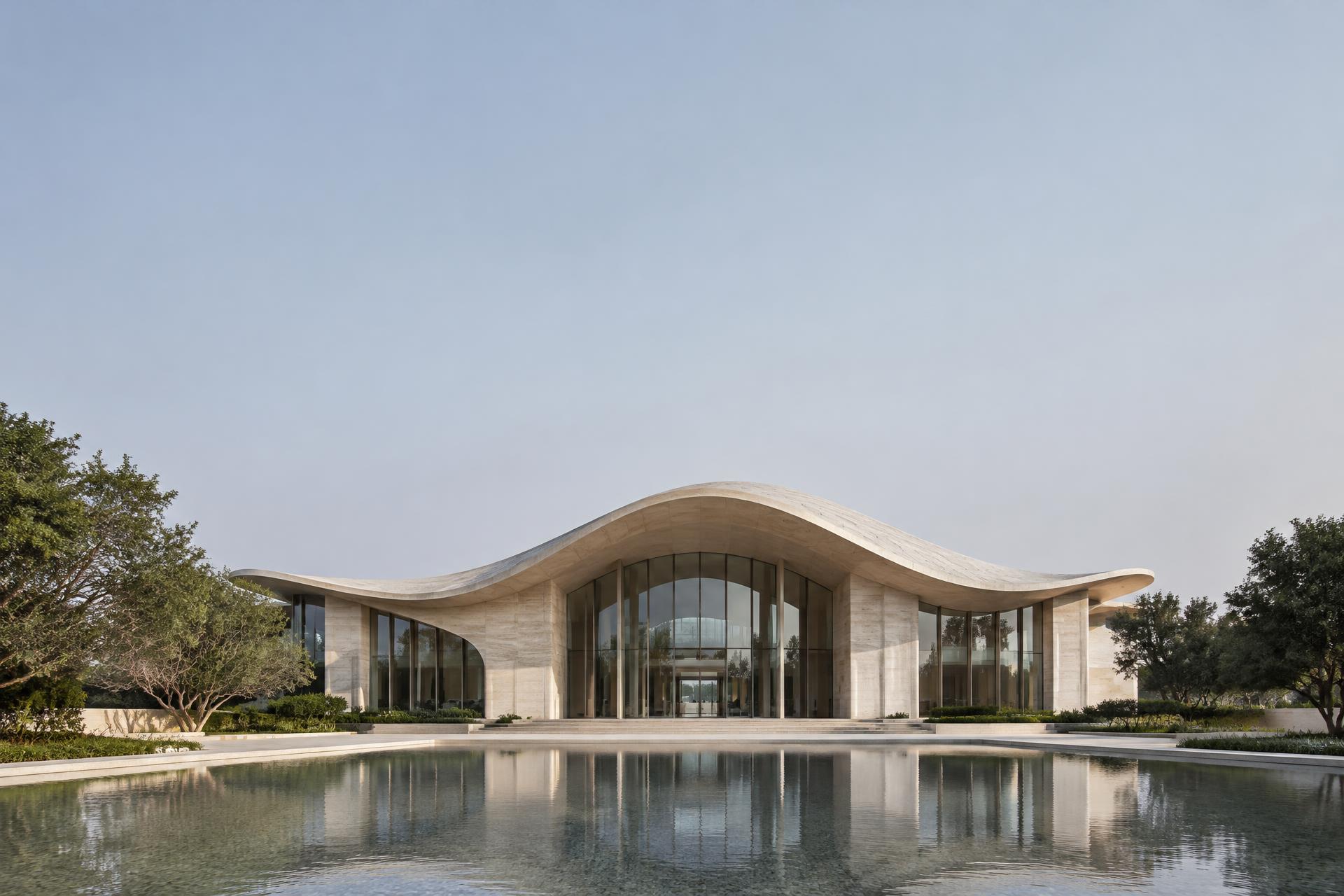 Sculptural contemporary architecture overlooking a reflecting pool